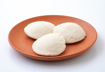 Fototapeta na wymiar South Indian Popular Breakfast Idli or Idly Served With Sambar And Coconut Chutney