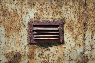 old metal wall with window