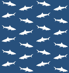 Vector seamless pattern of white silhouette of shark isolated on blue background 
