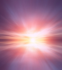 Obraz premium Abstract Beautiful fiery sunset and pink-purple clouds over the calm sea.