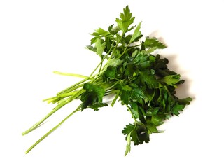 A bunch of fresh green parsley . Photos of parsley closeup.