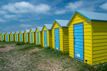 Brightly painted Beach Huts on Littlehampton Seafront UK.