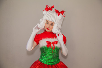 girl in the costume of the doll lol. Presenter for a children's holiday in the costume of a New Year's elf