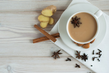 Traditional indian masala tea with spices. top view from copy space