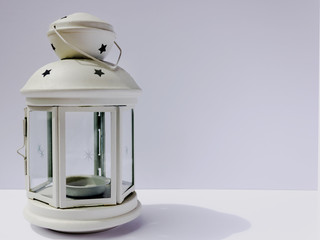 white lantern or candlestick on a white background