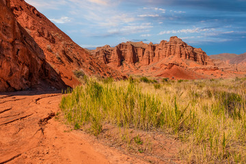 fantastic clay castles in the sandy desert of the red canyon Konorchek, in Kyrgyzstan