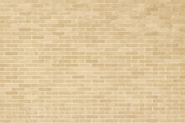 Brick wall texture pattern background in natural light ancient cream beige yellow brown