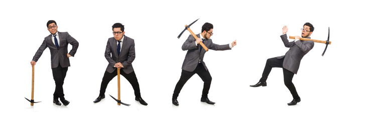 Young businessman holding a tool isolated on white