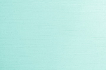 Green teal cotton silk blended fabric wall paper texture pattern background in pastel white pale green cyan turquoise blue color
