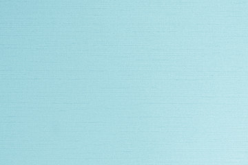 Blue silk fabric wallpaper satin texture pattern background in light pale green teal color 
