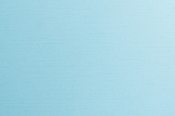 Blue silk fabric wallpaper satin texture pattern background in light pale green teal color 