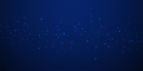 Sparse glowing snow Christmas background. Subtle f