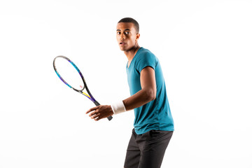 Afro American tennis player man over isolated white background .