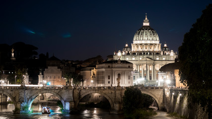 Fototapeta premium Walls of the Tiber river and the Basilica of San Pietro. Rome