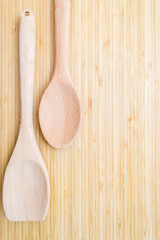 Kitchen utensils on wooden board