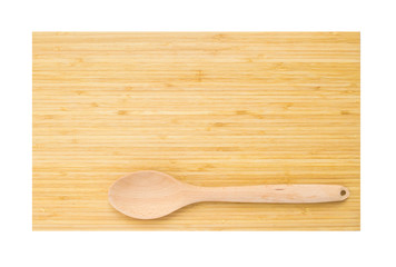 Isolated wooden board with wooden spoon