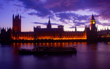 Glowing British Parliament Westminster Big Ban at Sunset in London United Kingdom