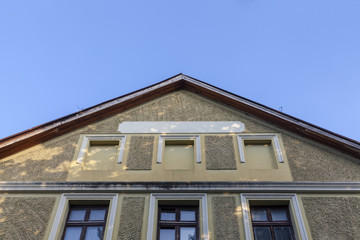 roof and facade of the old building