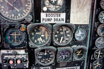 old vintage aircraft cockpit detail, pattern of multi meter gauge measure background