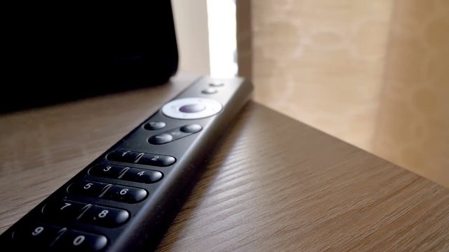 The closer look of the remote control of the tv