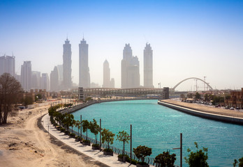 Obraz premium Dubai Creek river and Tolerance bridge. Cityscape
