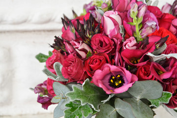 Stunning red bridal bouquet. Wedding ceremony.