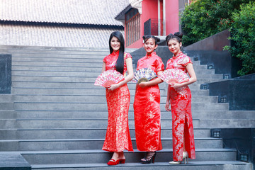 Obraz premium Beautiful woman group wearing Chinese dress
