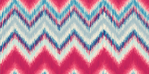 Modern Ikat Chevron Seamless Repeat Vector Pattern Swatch.  Ancient Indonesian Weaving Technique.  Ombre, gradient, colorful. Zig zag.
