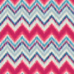 Modern Ikat Chevron Seamless Repeat Vector Pattern Swatch.  Ancient Indonesian Weaving Technique.  Ombre, gradient, colorful. Zig zag.