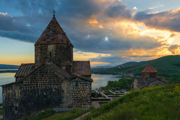 Beautiful sunset on Lake Sevan, dramatic sky over Sevanavank Monastery, Armenia