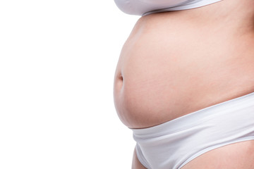 isolated fat belly of a woman in underwear on a white background