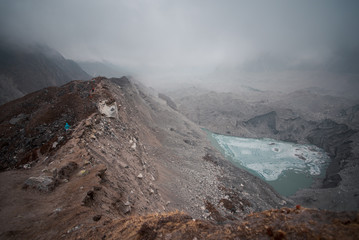 Tourists walking atop outlandish Ngozumpa glacier
