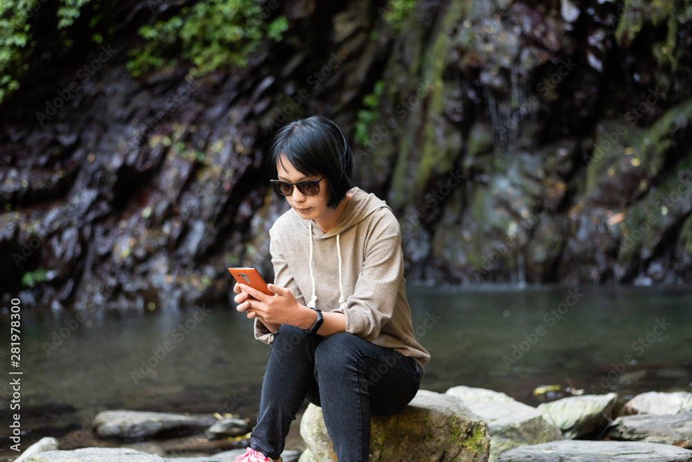 Poster asian woman using mobile phone