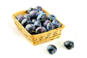 Plums in basket