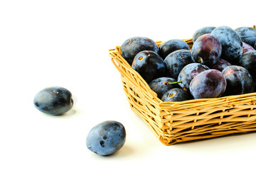 Plums in basket