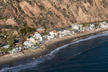 Fototapeta na wymiar Aerial view of shoreline houses north of Los Angeles and Santa Monica on Pacific Coast Highway in Malibu, California. 