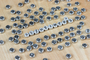World Alzheimer's Alzheimer's Day of plastic letters on a wooden background