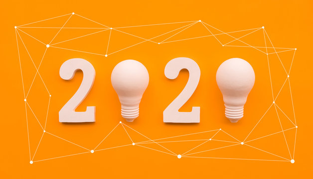 2020 creativity inspiration concepts with text nuber and lightbulb on color background.Business resolution