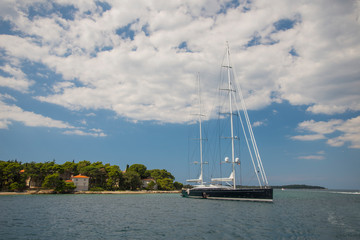 Obraz premium Holidays in Croatia, a big sailboat in Brijuni. Summer sunny day.