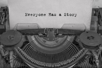 Everyone Has a Story typed words on a vintage typewriter. close up