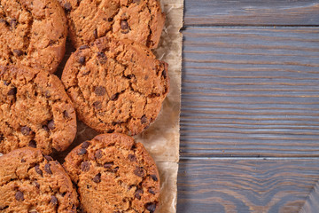 Chocolate oatmeal chip cookies on the rustic wooden table. Flat lay