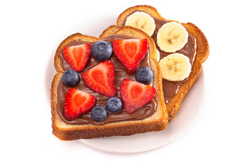 Two Pieces of Fruit and Chocolate Hazelnet Spread Toast on a White Background