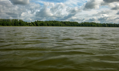 view of the lake with beautiful clouds.  sunny summer day, Lielezers, Latvia