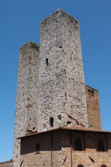 Fototapeta na wymiar Towers in San Gimignano, looking from Piazza della Cisterna