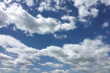 Fototapeta na wymiar Beautiful clouds against a blue sky background. Cloud sky. Blue sky with cloudy weather, nature cloud. White clouds, blue sky and sun