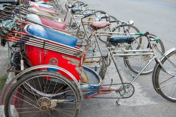 Fototapeta na wymiar THAILAND PHITSANULOK CITY ROAD BICYCLE TAXI