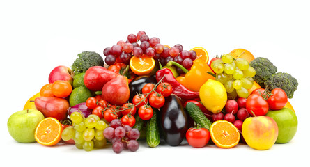 Lots of fresh and ripe berries, fruits, vegetables isolated on white