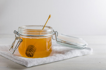 fresh honey on a white background with a copy space