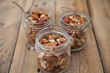 mix of nuts in a jar walnut migdale fox