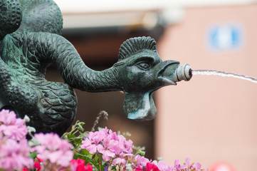 Closeup of bronze fountain in Basel Switzerland